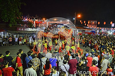 Traditional dragon dance and performance in Chinese culture at snake temple. Editorial Stock Photo